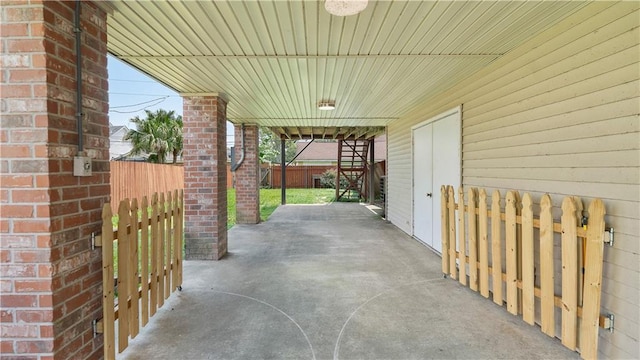41 Brandon Hall Dr Unit A, Destrehan, LA 70047 - view of patio / terrace with a carport