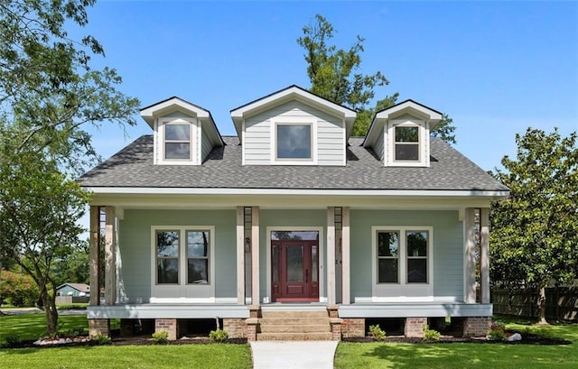 163 S 7th St, Ponchatoula, LA 70454 - view of front of home featuring a shingled roof and a porch