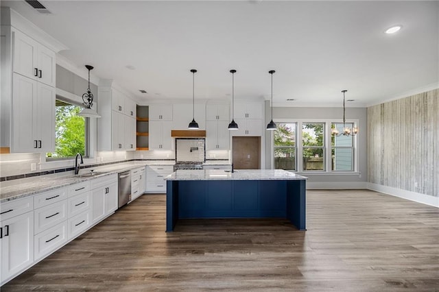 163 S 7th St, Ponchatoula, LA 70454 - kitchen with dishwasher, a chandelier, plenty of natural light, tasteful backsplash, and recessed lighting
