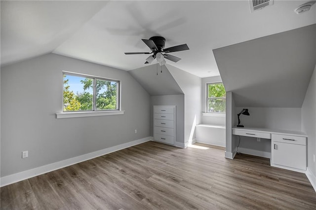 163 S 7th St, Ponchatoula, LA 70454 - bonus room with ceiling fan, lofted ceiling, wood finished floors, and an office area