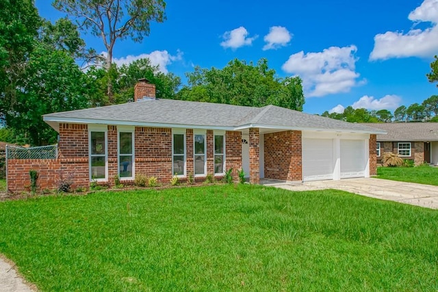 217 Chess Dr, Slidell, LA 70458 - ranch-style house with an attached garage, a chimney, a front lawn, driveway, and brick siding