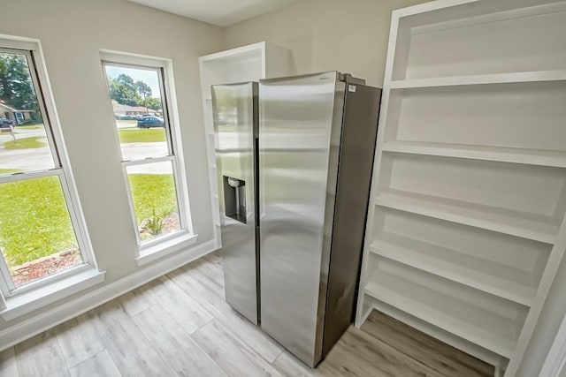 217 Chess Dr, Slidell, LA 70458 - kitchen featuring stainless steel refrigerator with ice dispenser and light wood-style flooring