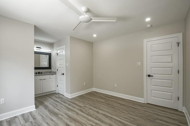 217 Chess Dr, Slidell, LA 70458 - spare room featuring a ceiling fan, light wood-type flooring, recessed lighting, and a smoke detector