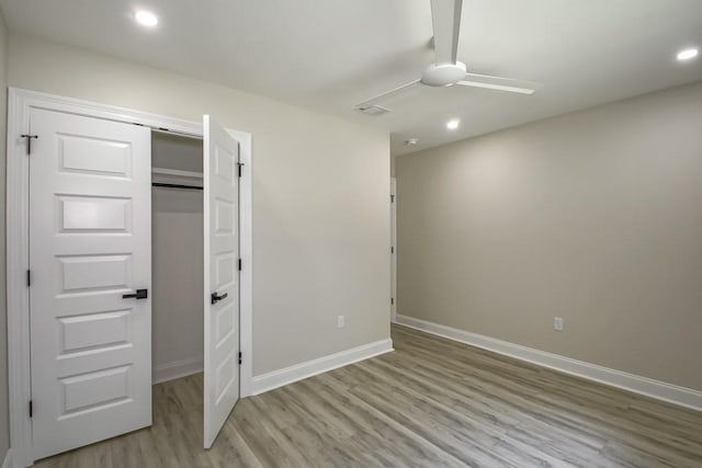 217 Chess Dr, Slidell, LA 70458 - unfurnished bedroom with light wood-type flooring, recessed lighting, a ceiling fan, and a closet