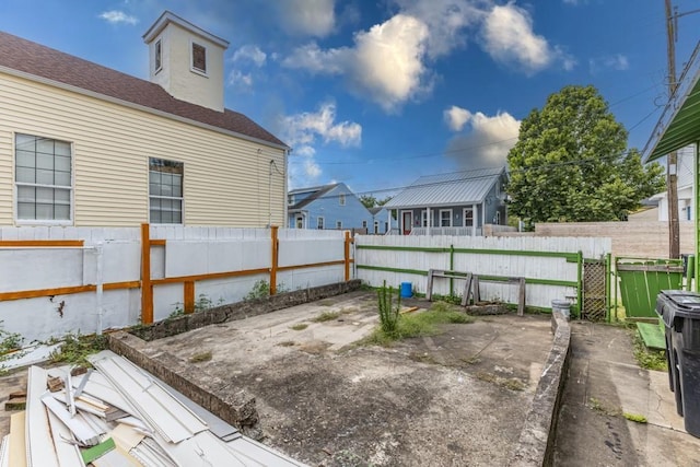 1345 Saint Anthony St, New Orleans, LA 70116 - view of yard with a patio area