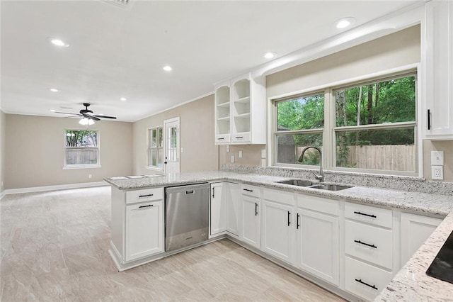 11 Karen Dr, Covington, LA 70433 - kitchen with dishwasher, white cabinets, healthy amount of natural light, and recessed lighting