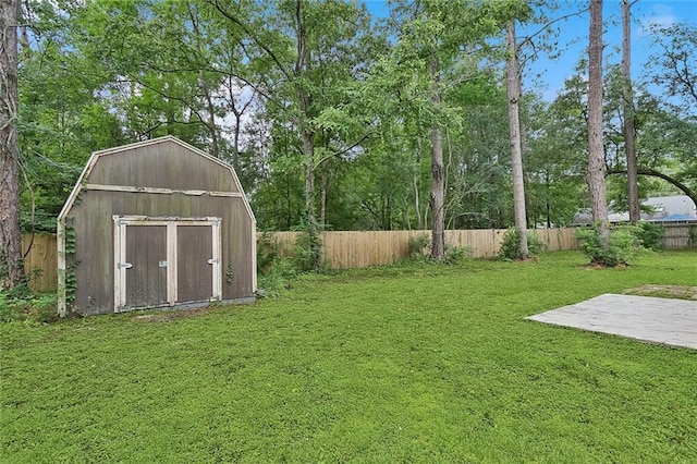 11 Karen Dr, Covington, LA 70433 - fenced backyard featuring a storage shed and a patio