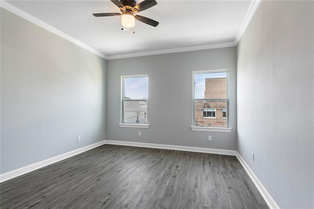 2626 N Dorgenois St, New Orleans, LA 70117 - unfurnished room featuring ornamental molding, dark wood-type flooring, and a ceiling fan