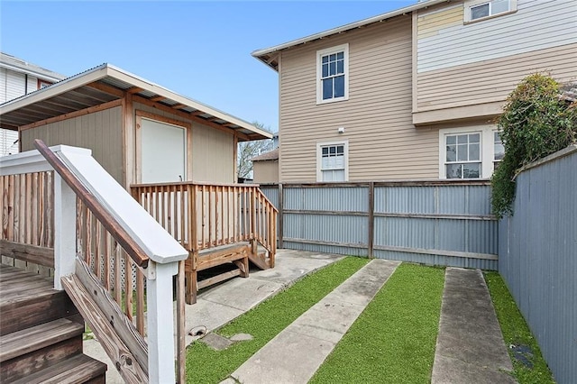 2907-09 Paris Ave, New Orleans, LA 70119 - fenced backyard featuring a deck
