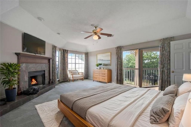 109 Topsl Dr Unit 109, Mandeville, LA 70448 - bedroom featuring carpet flooring, a high end fireplace, ceiling fan, and access to outside