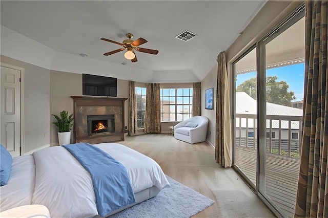 109 Topsl Dr Unit 109, Mandeville, LA 70448 - bedroom with access to outside, a high end fireplace, and ceiling fan