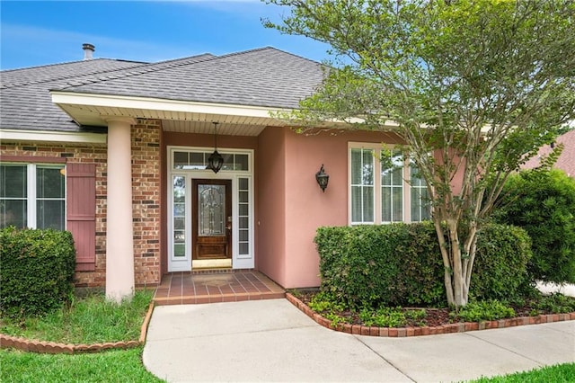 544 Waverly Dr, Slidell, LA 70461 - property entrance with roof with shingles and stucco siding