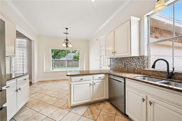 544 Waverly Dr, Slidell, LA 70461 - kitchen featuring stainless steel dishwasher, a peninsula, pendant lighting, ornamental molding, and white cabinets