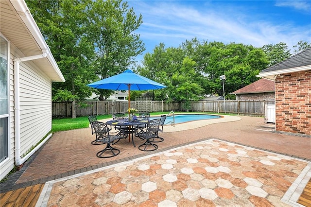 544 Waverly Dr, Slidell, LA 70461 - view of swimming pool featuring a patio, a fenced backyard, and outdoor dining space