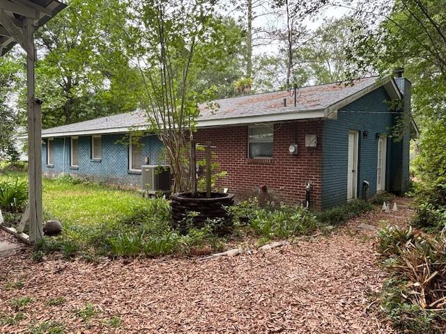 19343 9th Ave, Covington, LA 70433 - rear view of property with brick siding