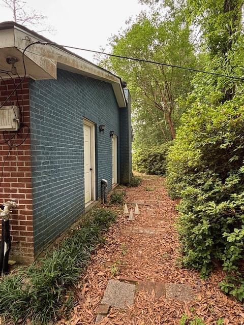19343 9th Ave, Covington, LA 70433 - view of side of property featuring brick siding