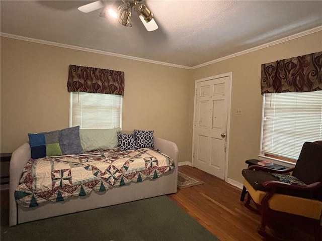 19343 9th Ave, Covington, LA 70433 - bedroom featuring wood finished floors, ornamental molding, and a ceiling fan
