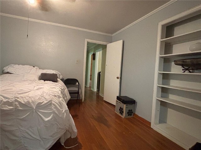 19343 9th Ave, Covington, LA 70433 - bedroom featuring wood finished floors, ornamental molding, and a ceiling fan