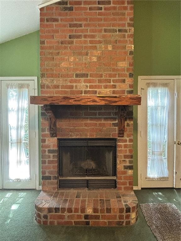 19343 9th Ave, Covington, LA 70433 - detailed view of carpet floors and a brick fireplace