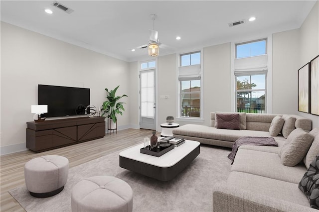 2028 Charles Dr, Chalmette, LA 70043 - living room with wood finished floors, plenty of natural light, recessed lighting, and a ceiling fan