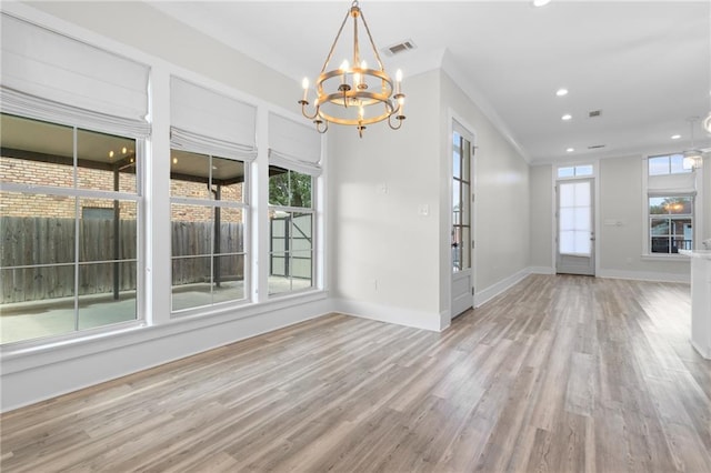2028 Charles Dr, Chalmette, LA 70043 - unfurnished dining area with a chandelier, wood finished floors, and recessed lighting