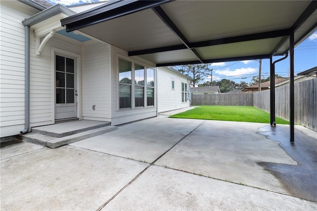 2028 Charles Dr, Chalmette, LA 70043 - fenced backyard with a patio area