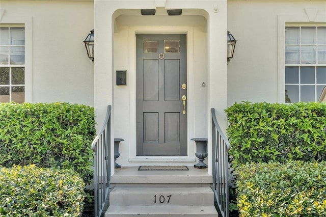 107 Melody Dr, Metairie, LA 70001 - property entrance with stucco siding