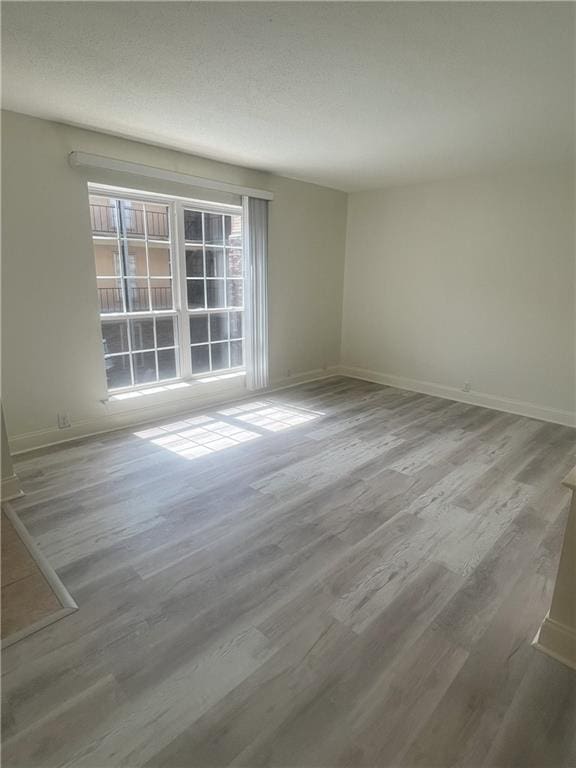 3320 N Arnoult Rd Unit 239, Metairie, LA 70002 - spare room with wood finished floors and baseboards