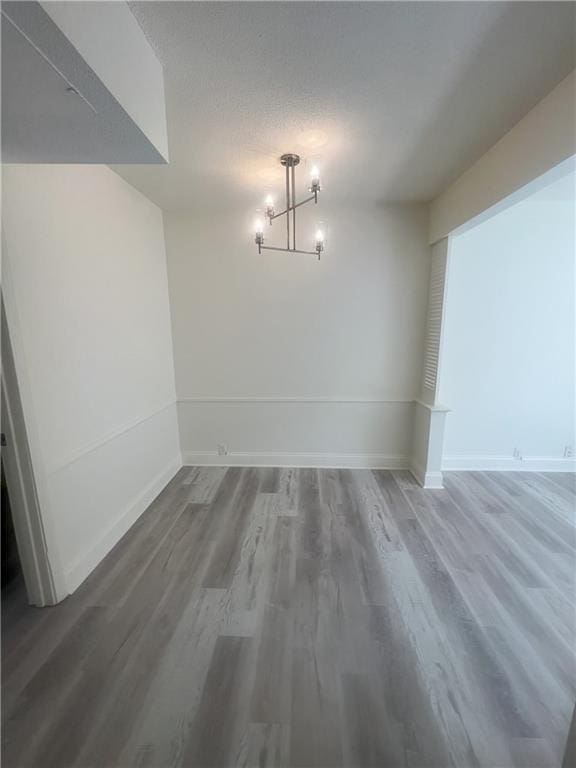 3320 N Arnoult Rd Unit 239, Metairie, LA 70002 - unfurnished dining area with a chandelier and wood finished floors