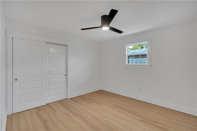 1208 Madison St, Metairie, LA 70001 - unfurnished bedroom featuring light wood-style flooring, a closet, and ceiling fan