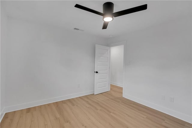 1208 Madison St, Metairie, LA 70001 - empty room featuring light wood-style floors and a ceiling fan