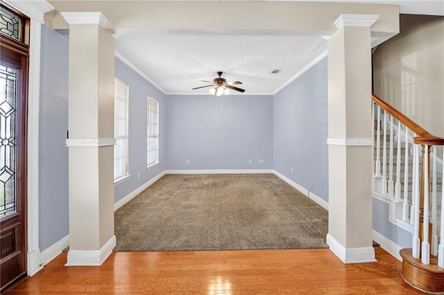2004 Dierdorff Ct, Slidell, LA 70461 - carpeted foyer entrance featuring crown molding, plenty of natural light, ceiling fan, stairs, and wood finished floors