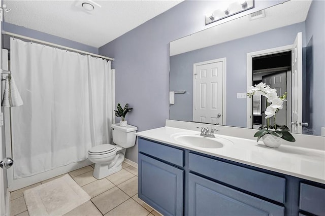 2004 Dierdorff Ct, Slidell, LA 70461 - bathroom with vanity, tile patterned flooring, shower / bath combo with shower curtain, and a textured ceiling