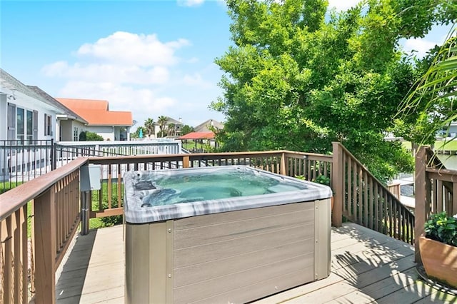 1410 Royal Palm Dr, Slidell, LA 70458 - wooden terrace featuring a hot tub