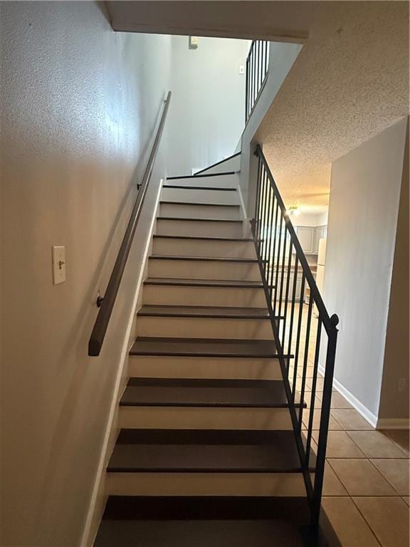 3112 Phoenix St Unit D, Kenner, LA 70065 - staircase with tile patterned floors and baseboards
