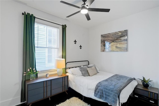 2231 Constance St, New Orleans, LA 70130 - bedroom with multiple windows and ceiling fan