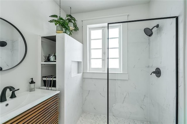 2231 Constance St, New Orleans, LA 70130 - bathroom featuring a marble finish shower and vanity