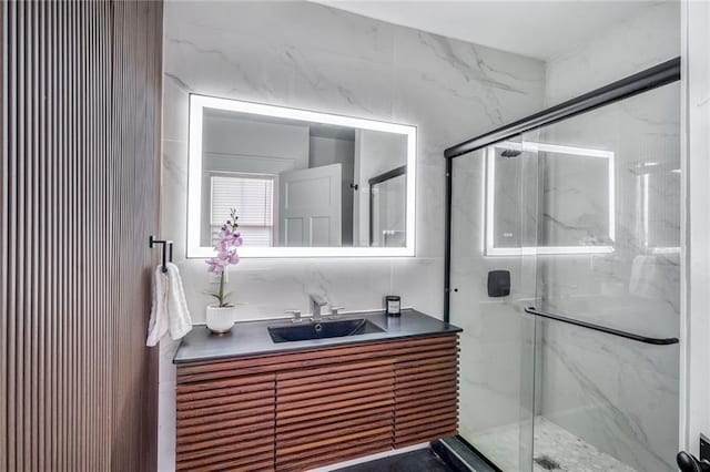 2231 Constance St, New Orleans, LA 70130 - full bath featuring vanity and a marble finish shower