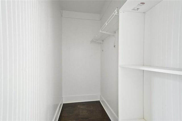 2231 Constance St, New Orleans, LA 70130 - spacious closet featuring dark wood finished floors