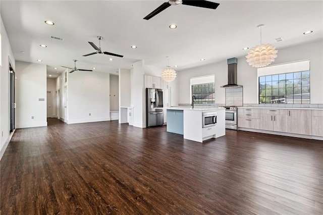 6000 Franklin Ave, New Orleans, LA 70122 - unfurnished living room with ceiling fan, dark wood finished floors, and recessed lighting