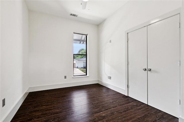 6000 Franklin Ave, New Orleans, LA 70122 - unfurnished bedroom with wood finished floors, a closet, and a ceiling fan