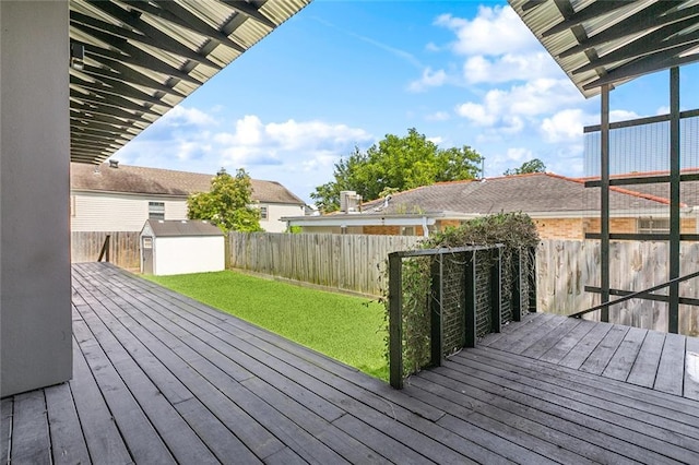 6000 Franklin Ave, New Orleans, LA 70122 - wooden terrace with a shed and a fenced backyard