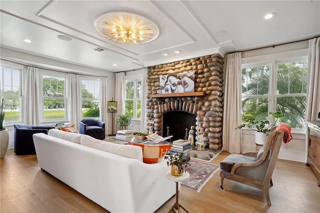 1455 Moss St, New Orleans, LA 70119 - living area featuring wood finished floors, a large fireplace, and recessed lighting