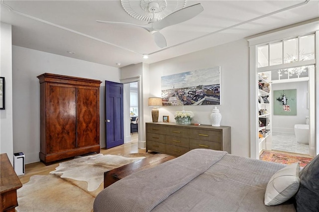 1455 Moss St, New Orleans, LA 70119 - bedroom with light wood finished floors, ceiling fan, ensuite bath, and recessed lighting