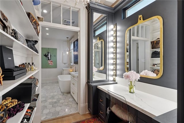1455 Moss St, New Orleans, LA 70119 - full bath with vanity and a freestanding bath