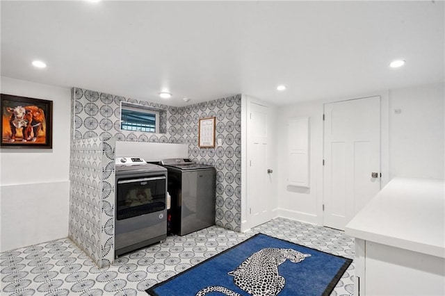 1455 Moss St, New Orleans, LA 70119 - washroom featuring washer and dryer, recessed lighting, and light floors