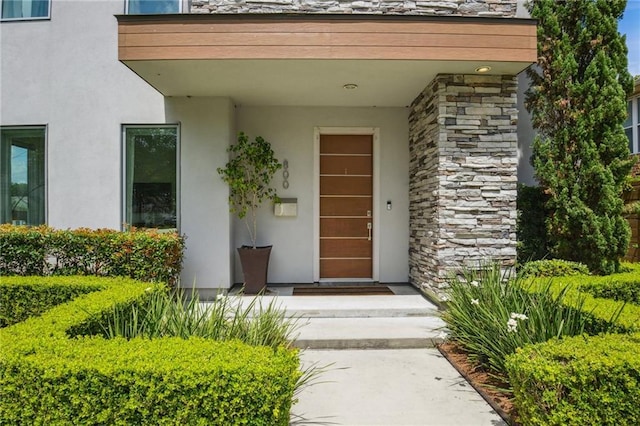 800 Ridgelake Dr, Metairie, LA 70001 - property entrance with stucco siding and stone siding