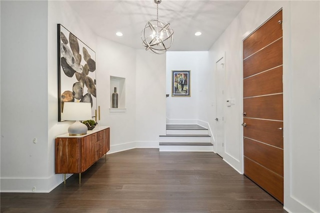 800 Ridgelake Dr, Metairie, LA 70001 - hallway with a chandelier, dark wood-style floors, recessed lighting, and stairway