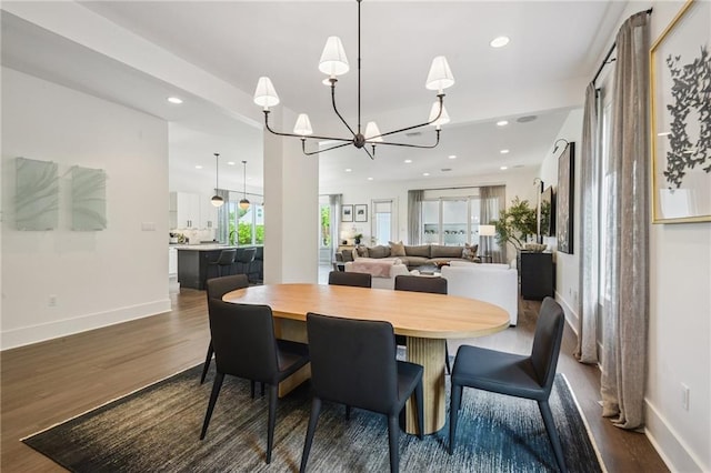 800 Ridgelake Dr, Metairie, LA 70001 - dining area featuring dark wood-style flooring, a chandelier, and recessed lighting