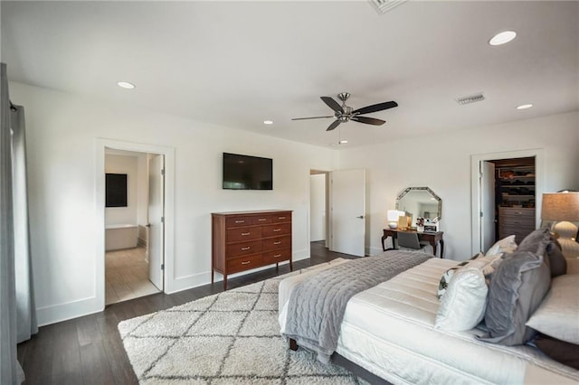 800 Ridgelake Dr, Metairie, LA 70001 - bedroom featuring recessed lighting, wood finished floors, a walk in closet, a ceiling fan, and ensuite bath